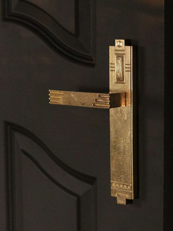 A large view of a natural brass Finish passage door lever